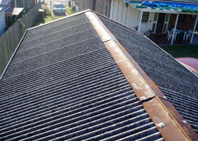 Asbestos roof removal